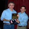 Phil Cultrera receives lifetime membership plaque from President John Shaheen